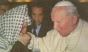 A Muslim and a former terrorist.  It does not matter for the Pope, since he do want to bow down and kiss the idol
