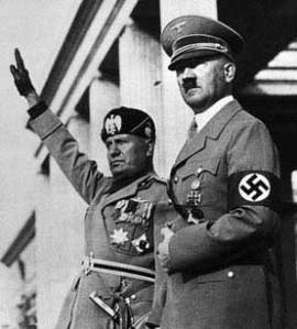 Mussolini and Hitler. Two stern faced man came to the reque of the Pope of Rome. 