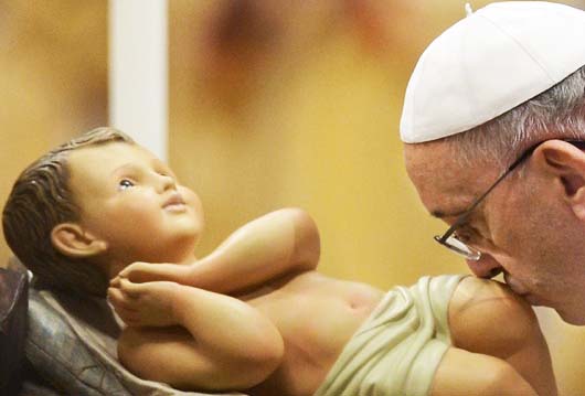 The Pope bow an kisses an idol made of plastic, claiming this to be "Jesus". 
