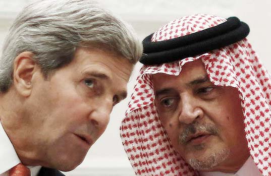 ‪US Secretary of State John Kerry and Saudi Foreign Minister Prince Saud al-Faisal talk during a joint press conference in Riyadh. Photo: AFP‬