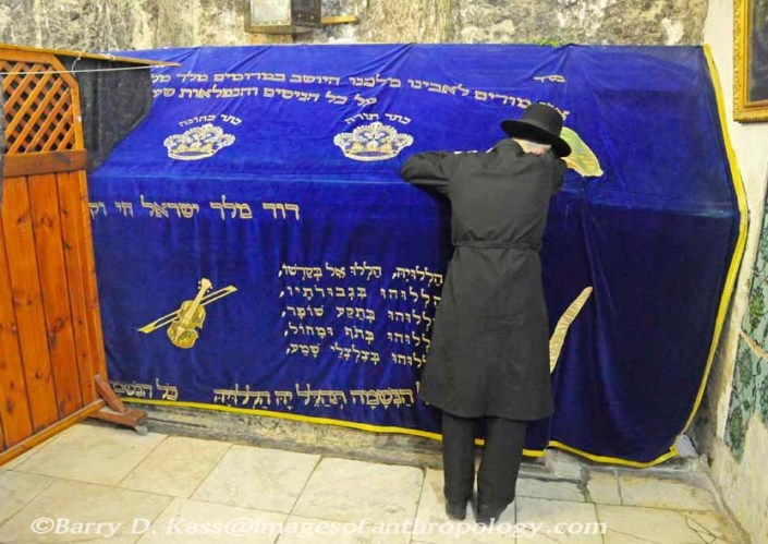 On Orthodox Jew is crying at the tomb of King David, soon to be controlled by the Vatican. 