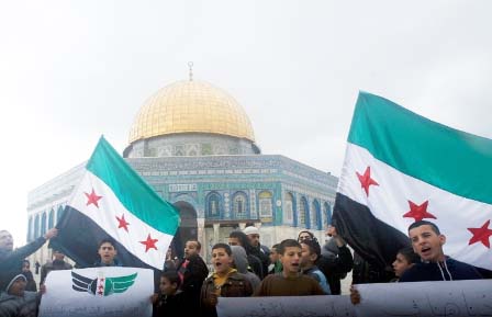 Arabs shout slogans against the Assad regime in demonstration at Al Aqsa mosque in Jerusalem earlier this year
