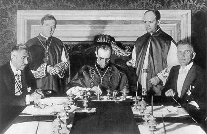 Eugenio Pacelli, later Pope Pius XII, signs the "Reichskonkordat" with the national socialist government under Adolf Hitler on July 20, 1933