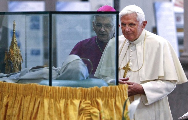 Pope Benedict XVI views the mummified body of Santa Rosa in her shrine during a visit to Viterbo